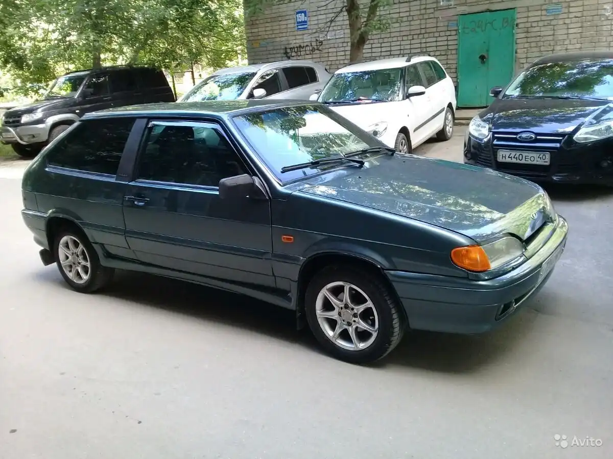 Фото автомобиля FORD D FOCUS, 2012 — госномер Н440ЕО40. Цвет: ЧЕРНЫЙ