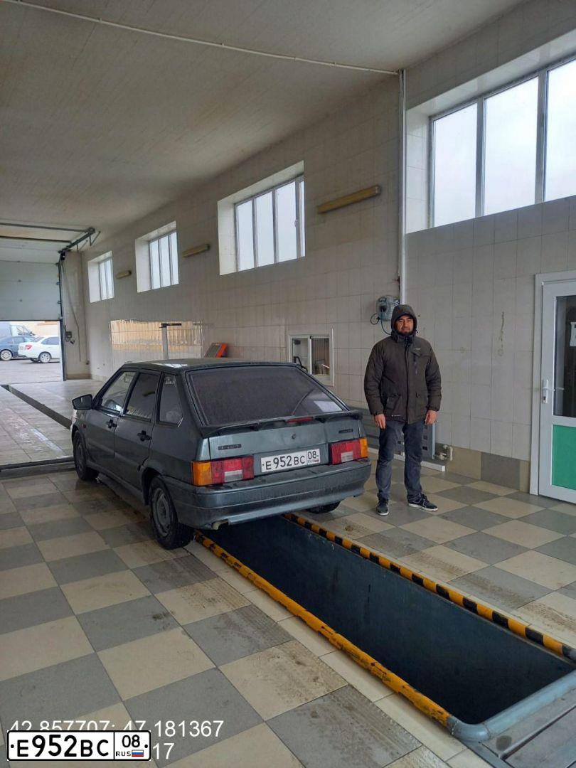 Фото автомобиля LADA 2114 SAMARA, 2010 — госномер Е952СВ05. Цвет: СЕРО-СИНЕ-ЗЕЛЕНЫЙ