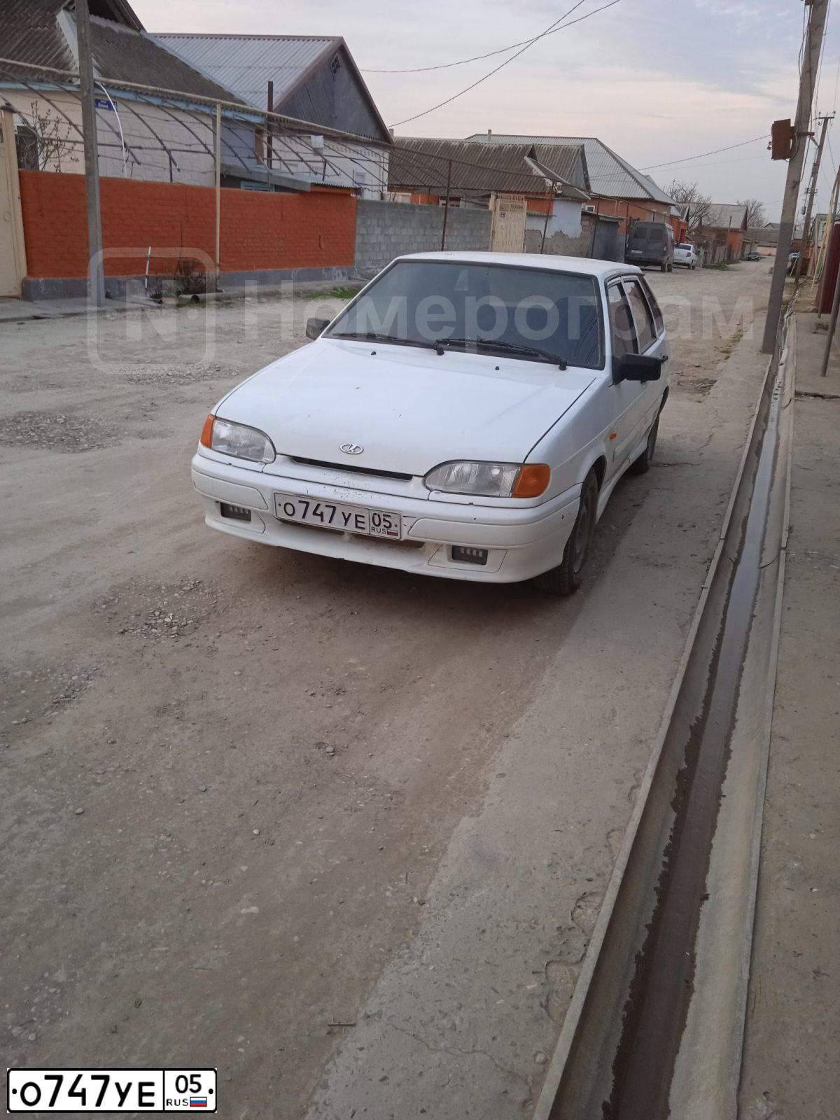 Фото автомобиля LADA 2114 SAMARA, 2011 — госномер О747УЕ05. Цвет: Белый