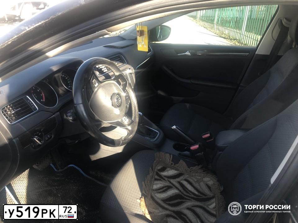 Фото автомобиля VOLKSWAGEN JETTA, 2015 — госномер У519РК72. Цвет: ЧЕРНЫЙ