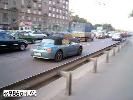 Фото автомобиля BMW Z 4, 2004 — госномер Р216ОН77. Цвет: ГОЛУБОЙ