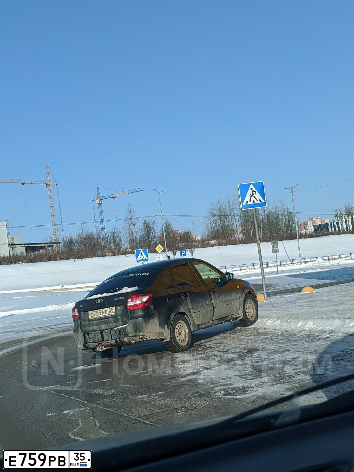 Фото автомобиля LADA 2191 GRANTA, 2015 — госномер Е759РВ35. Цвет: ЧЕРНЫЙ