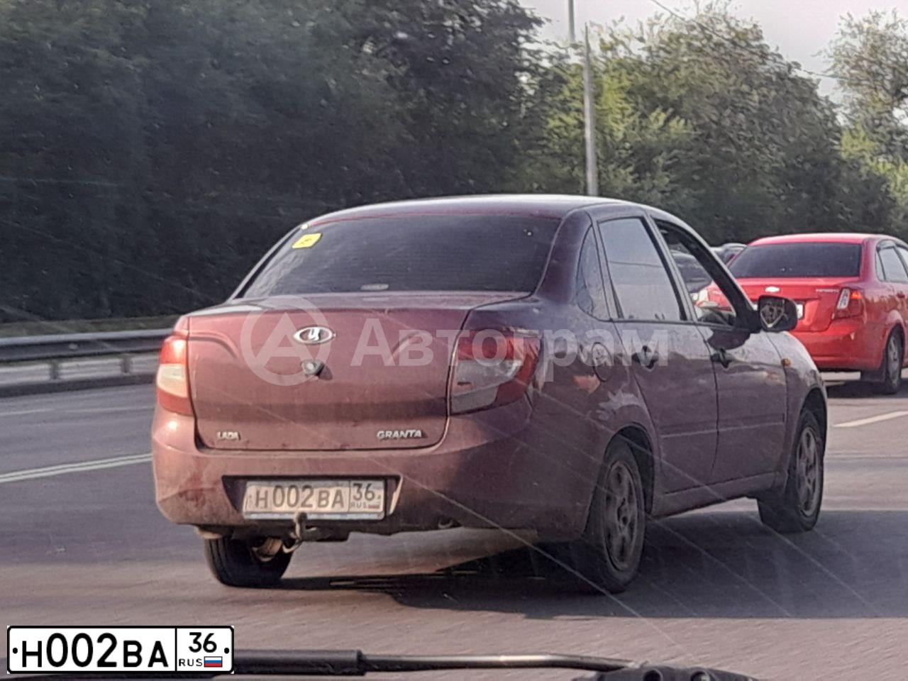 Фото автомобиля LADA 2190 GRANTA, 2013 — госномер Н002ВА36. Цвет: СЕРЕБРИСТО-КРАСНЫЙ