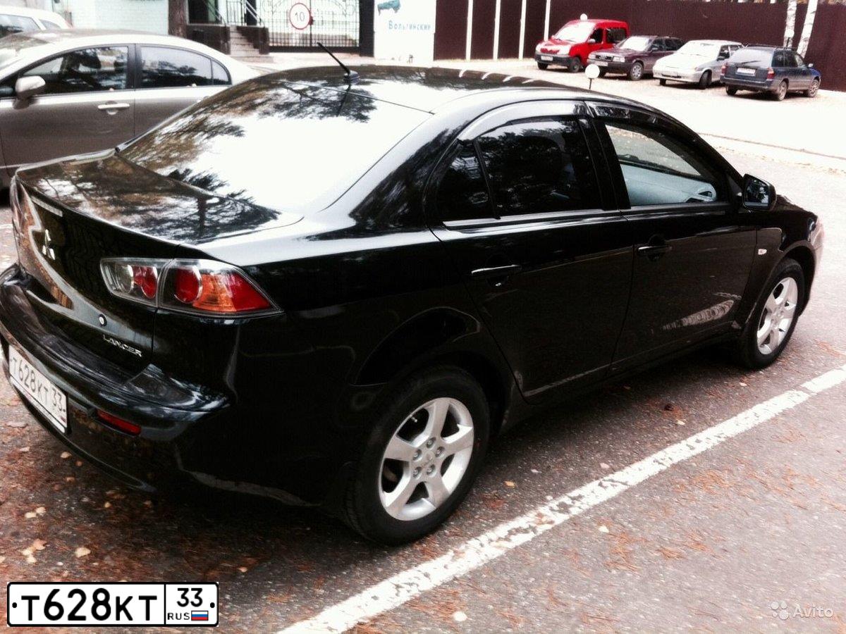 Фото автомобиля MITSUBISHI LANCER, 2010 — госномер Т628КТ33. Цвет: ЧЕРНЫЙ