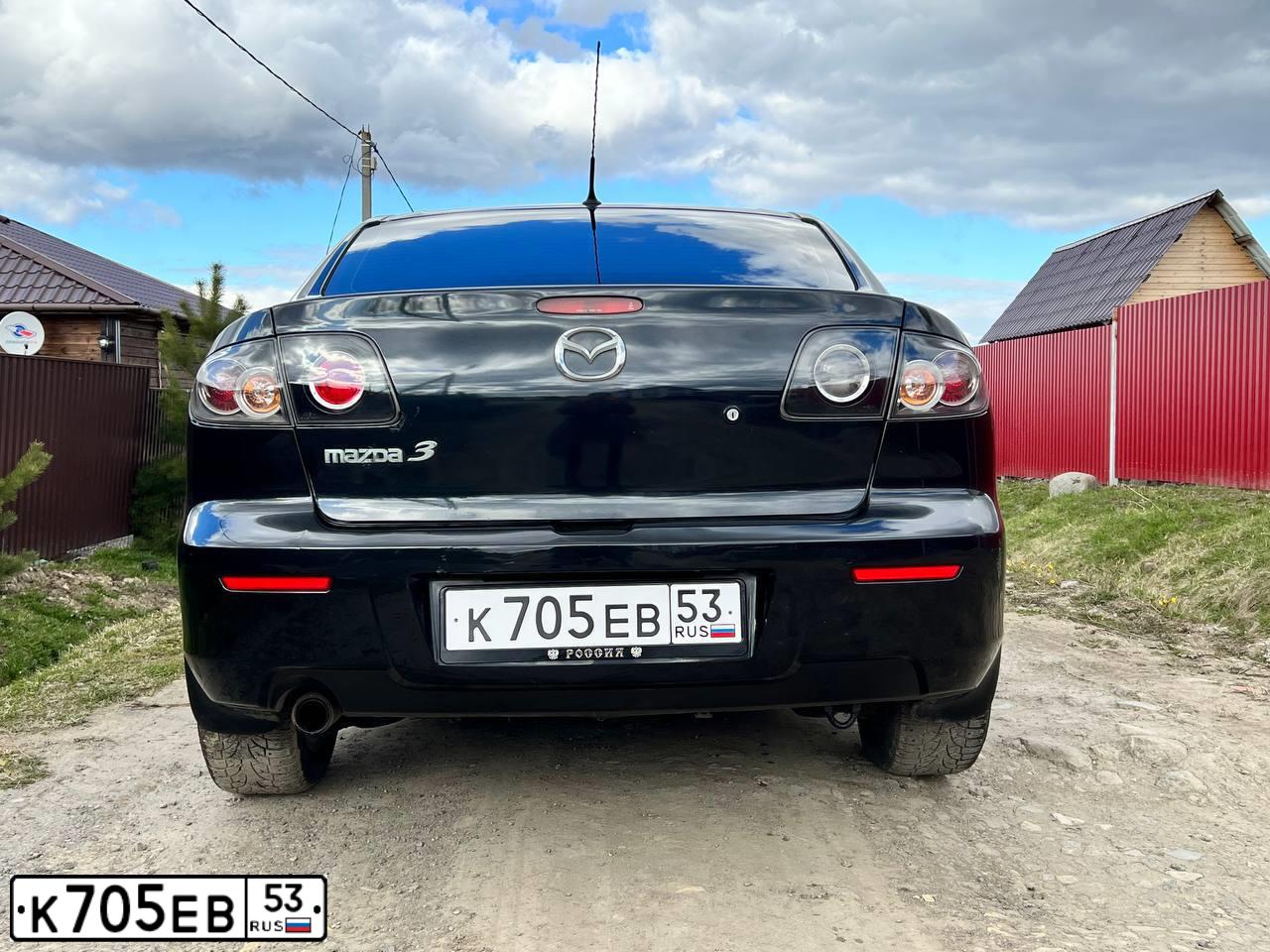 Фото автомобиля MAZDA 3, 2008 — госномер Н273КА10. Цвет: ЧЕРНЫЙ