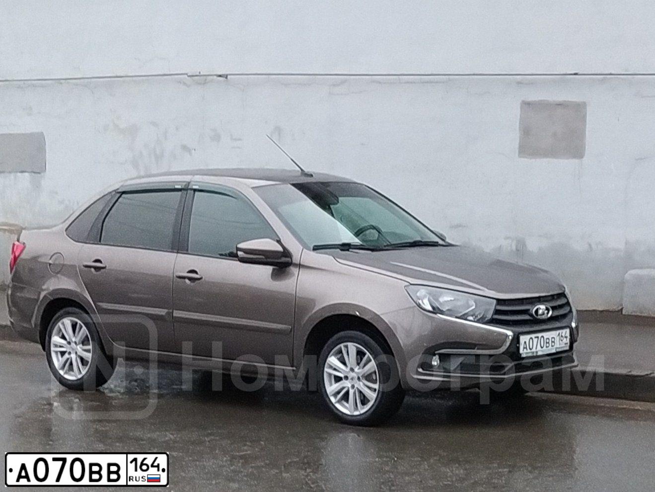 Фото автомобиля LADA 2114 SAMARA, 2012 — госномер А070ВВ164. Цвет: ТЕМНО-ВИШНЕВЫЙ