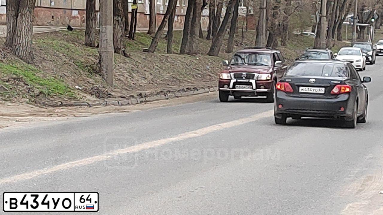 Фото автомобиля KIA RIO, 2012 — госномер В434УО64. Цвет: ЧЕРНЫЙ