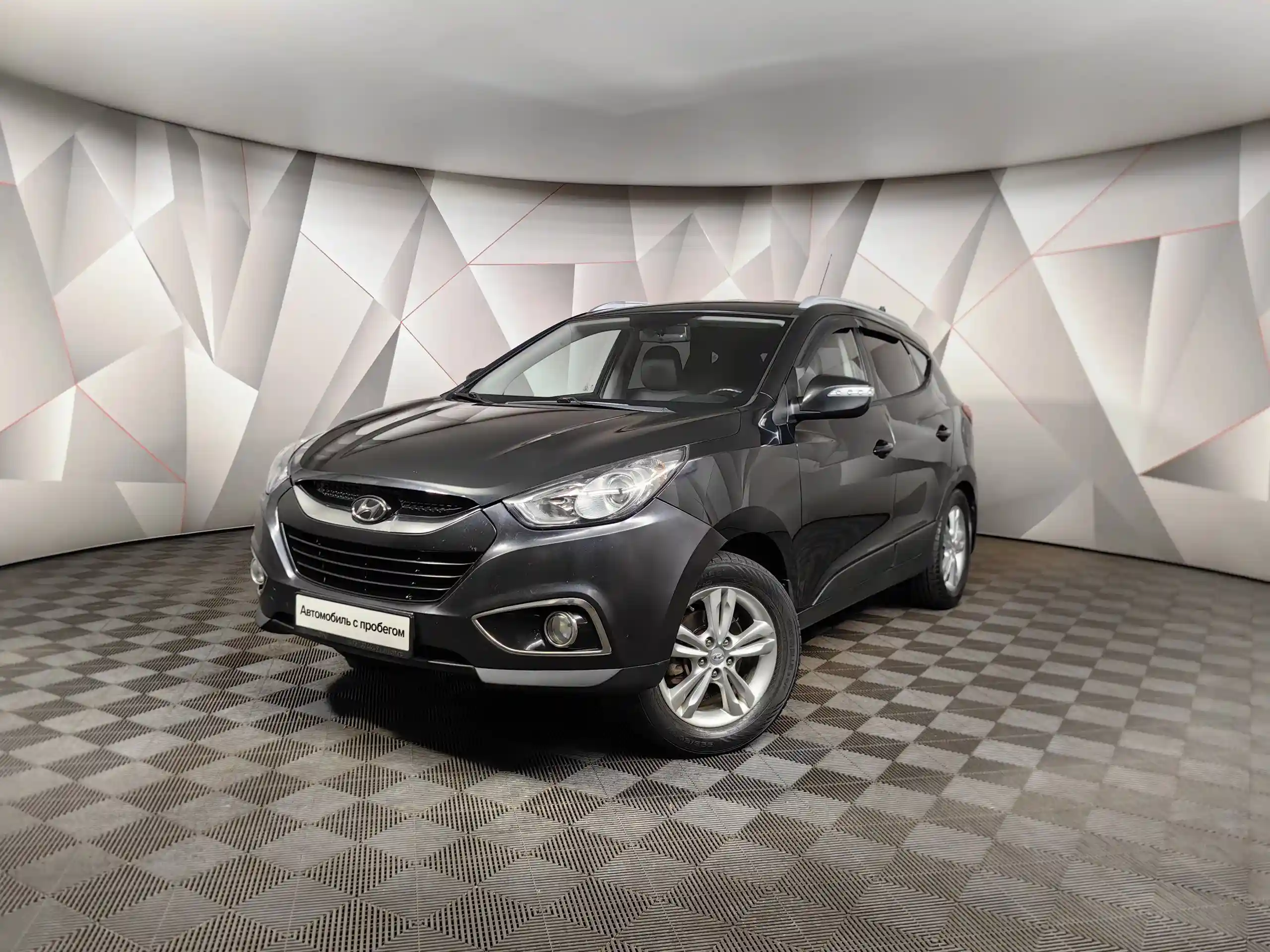 Фото автомобиля HYUNDAI IX35, 2010 — госномер О150КЕ190. Цвет: ЧЕРНЫЙ
