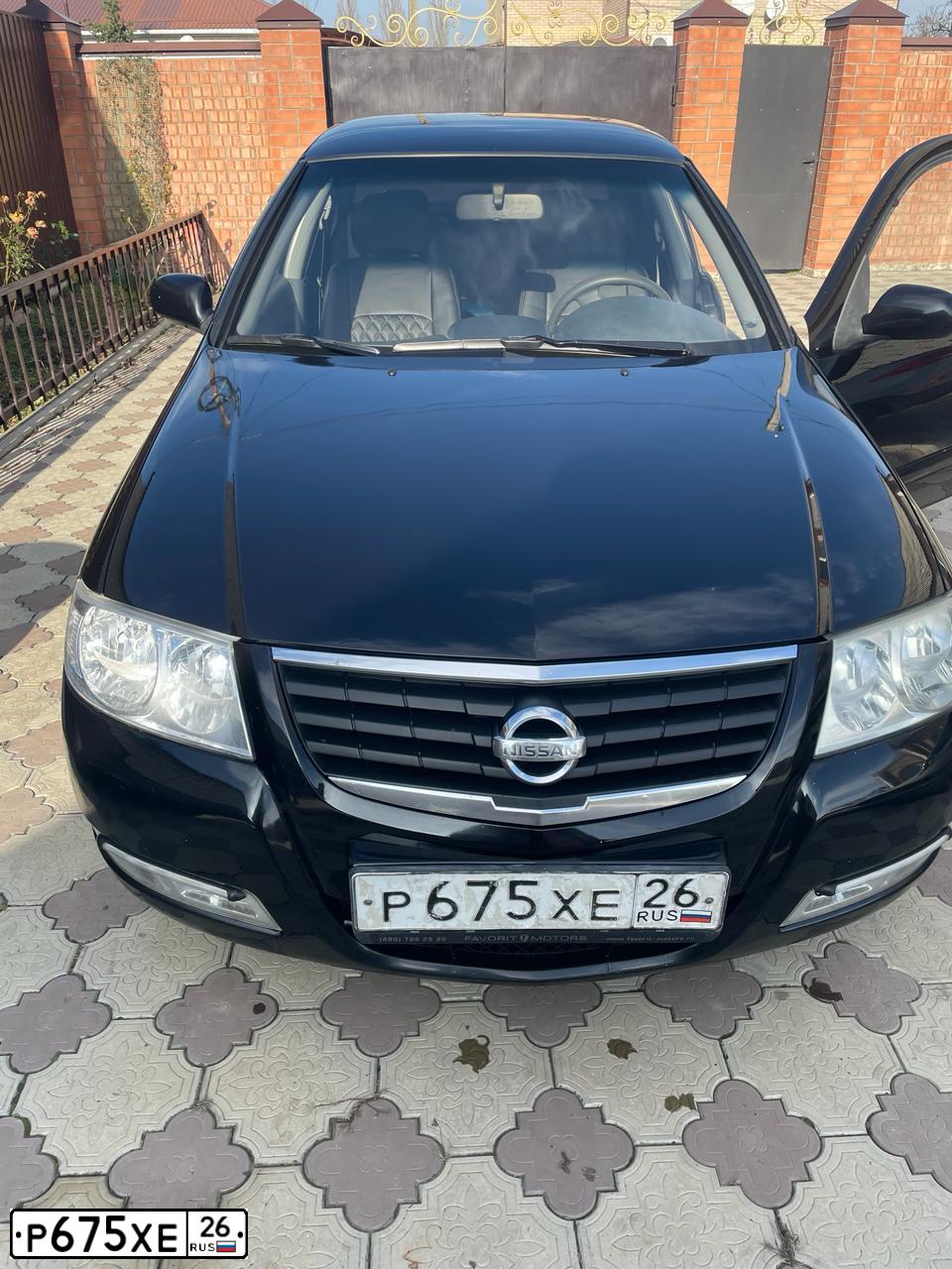 Фото автомобиля NISSAN ALMERA, 2007 — госномер Р675ХЕ26. Цвет: ЧЕРНЫЙ