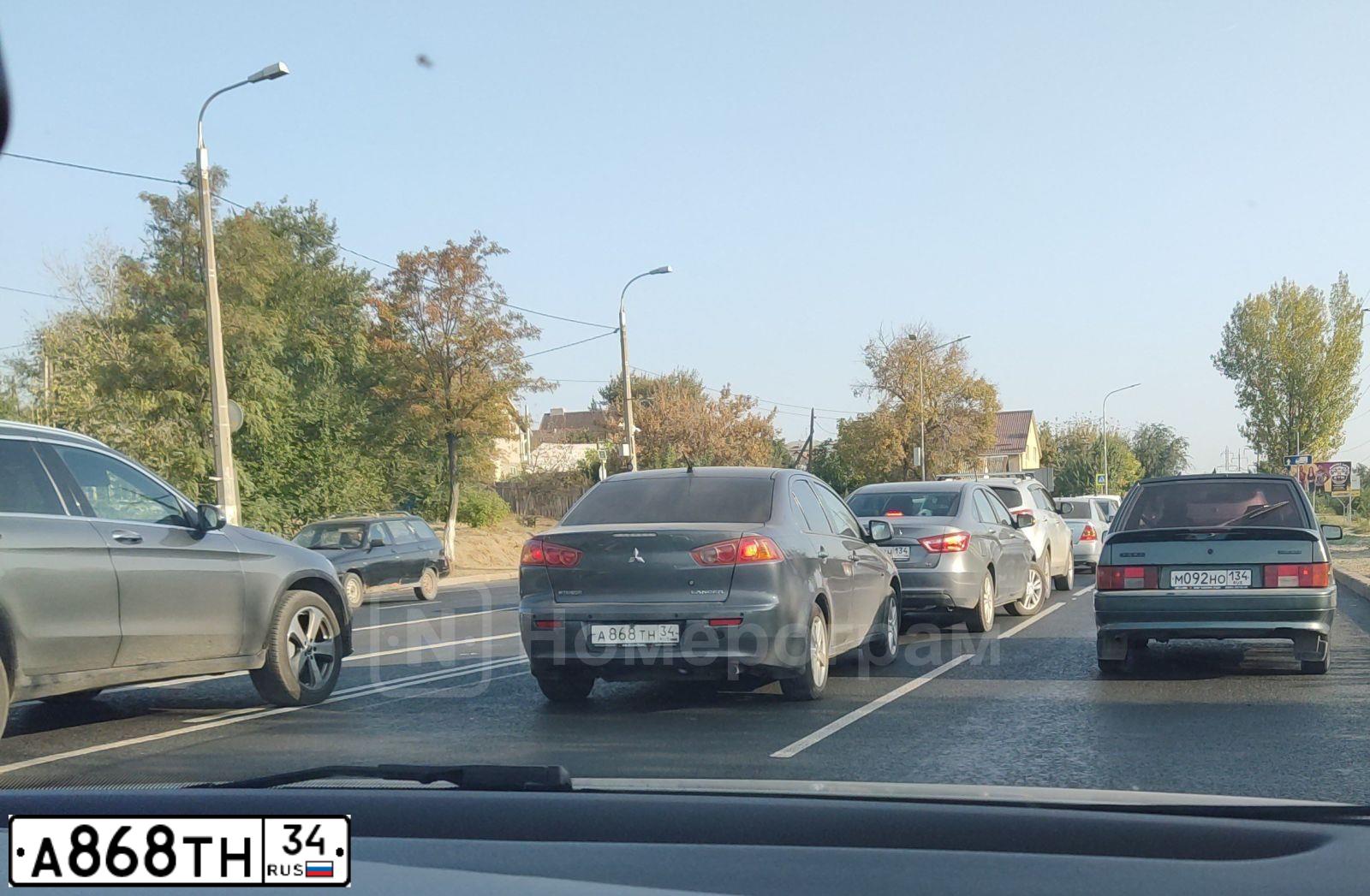 Фото автомобиля MITSUBISHI LANCER, 2008 — госномер А868ТН34. Цвет: СЕРЫЙ