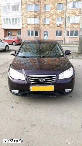 Фото автомобиля HYUNDAI ELANTRA, 2010 — госномер Н077УЕ196. Цвет: ТЕМНО-БОРДОВЫЙ