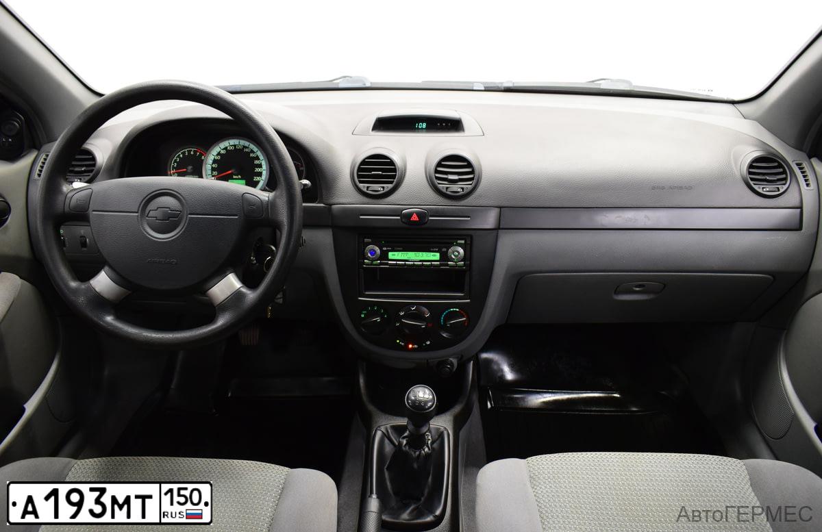 Фото автомобиля CHEVROLET LACETTI, 2008 — госномер М186ХР82. Цвет: Красный