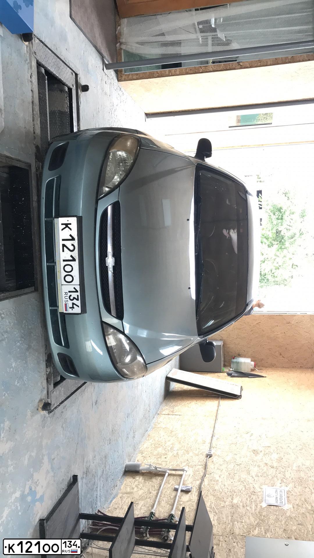 Фото автомобиля CHEVROLET LACETTI, 2005 — госномер В657МХ92. Цвет: ЗЕЛЕНЫЙ