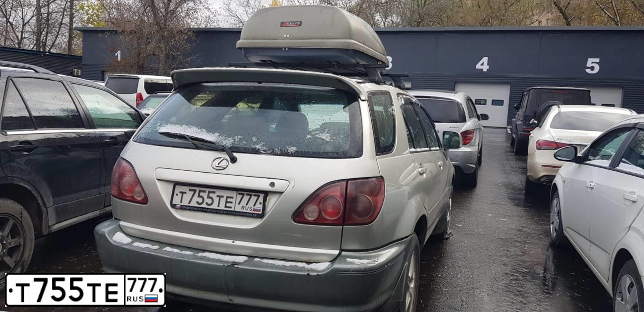 Фото автомобиля LEXUS RX, 1999 — госномер Т755ТЕ777. Цвет: Серебристый