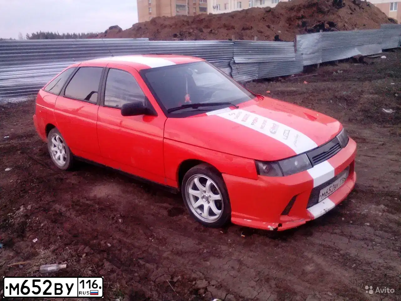 Фото автомобиля LADA 2112, 2000 — госномер В870МХ16. Цвет: ОРАНЖЕВЫЙ