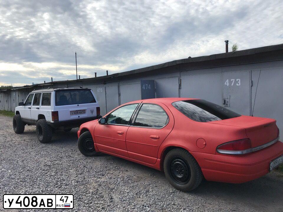 Фото автомобиля JEEP CHEROKEE, 1992 — госномер К421НВ47. Цвет: Белый