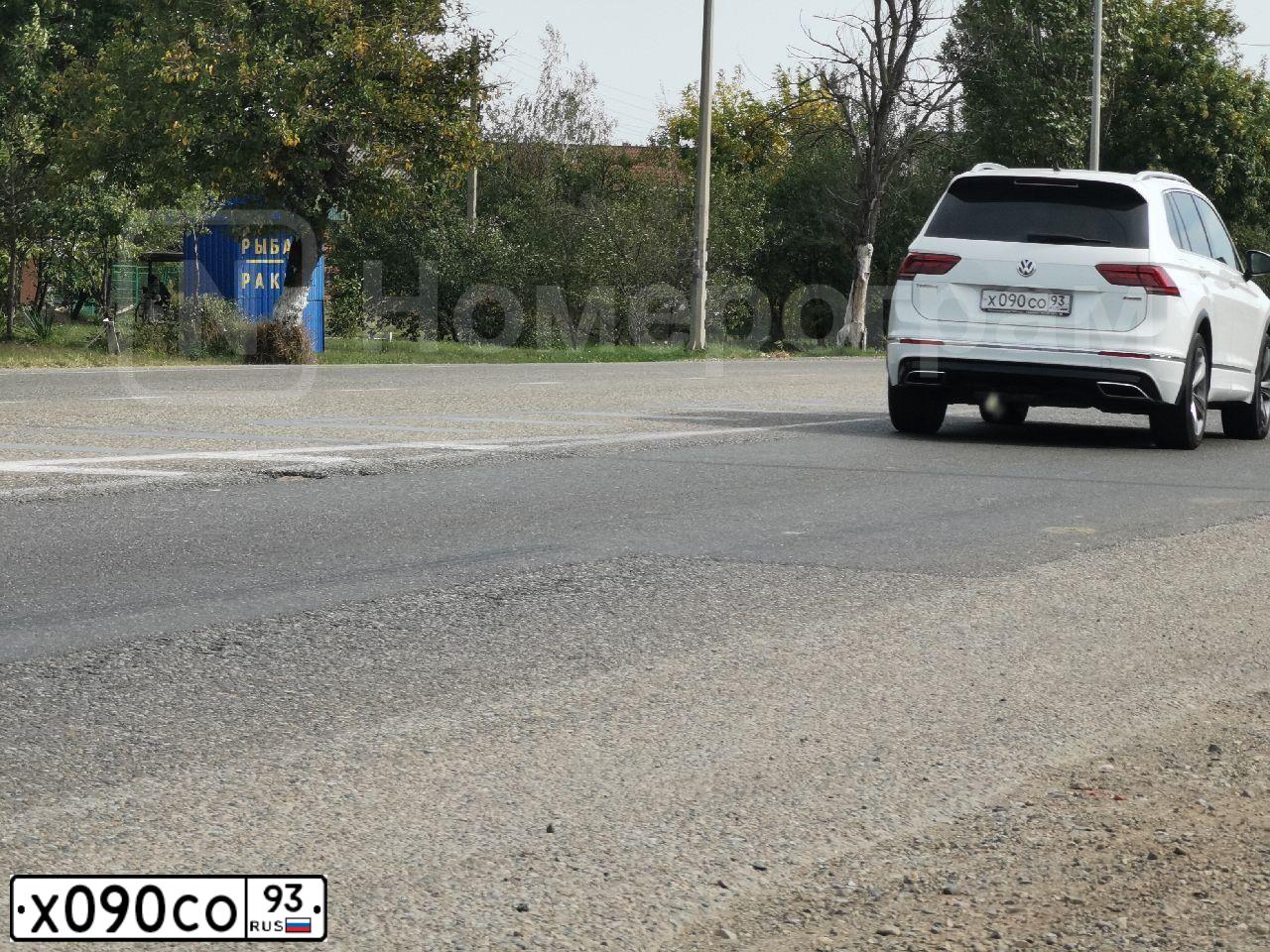 Фото автомобиля KIA SPORTAGE, 2009 — госномер Х090СО93. Цвет: ПЕРЛАМ-СЕРЕБРИСТЫЙ