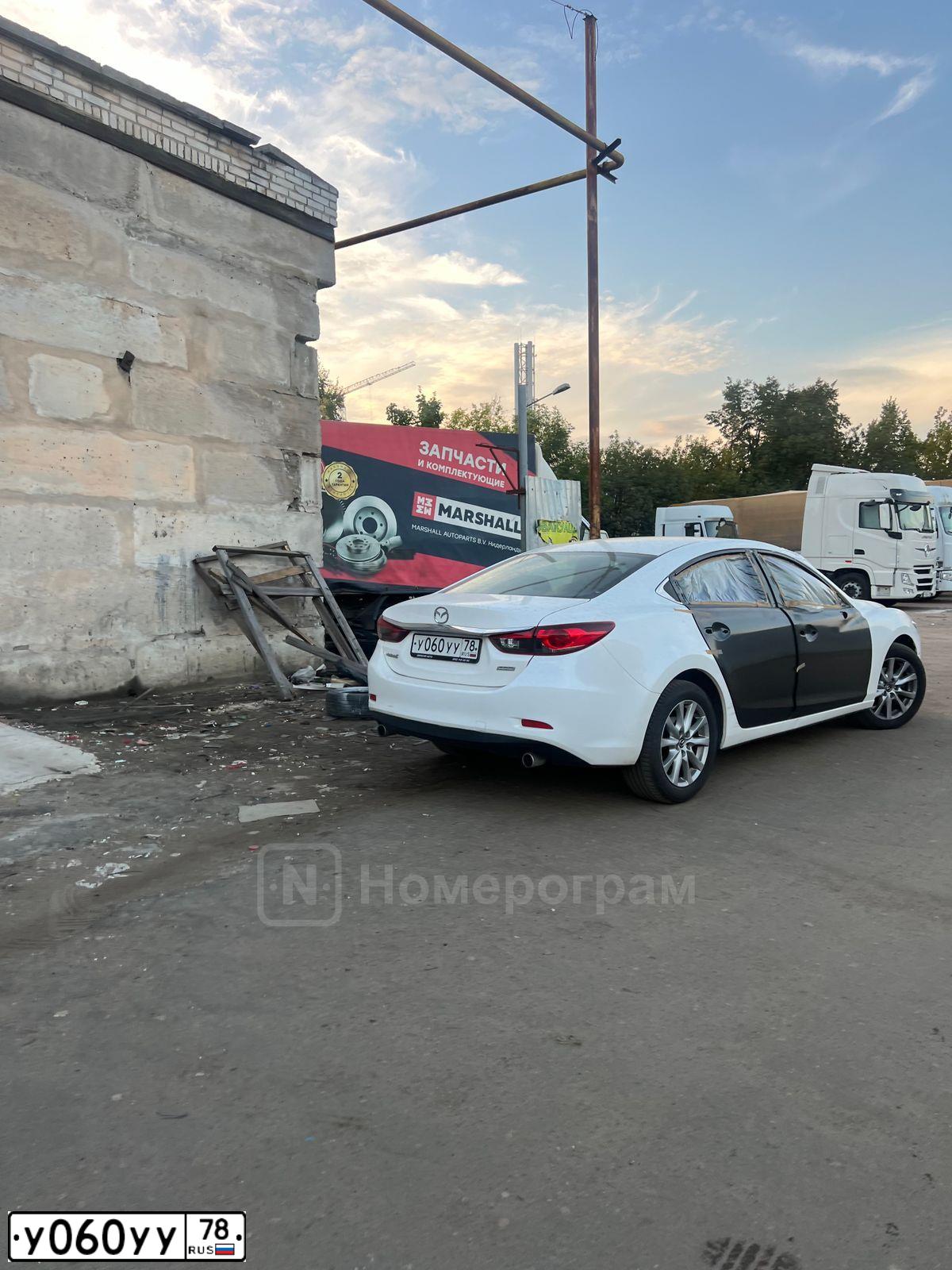 Фото автомобиля CHEVROLET CRUZE, 2010 — госномер У060УУ78. Цвет: Белый