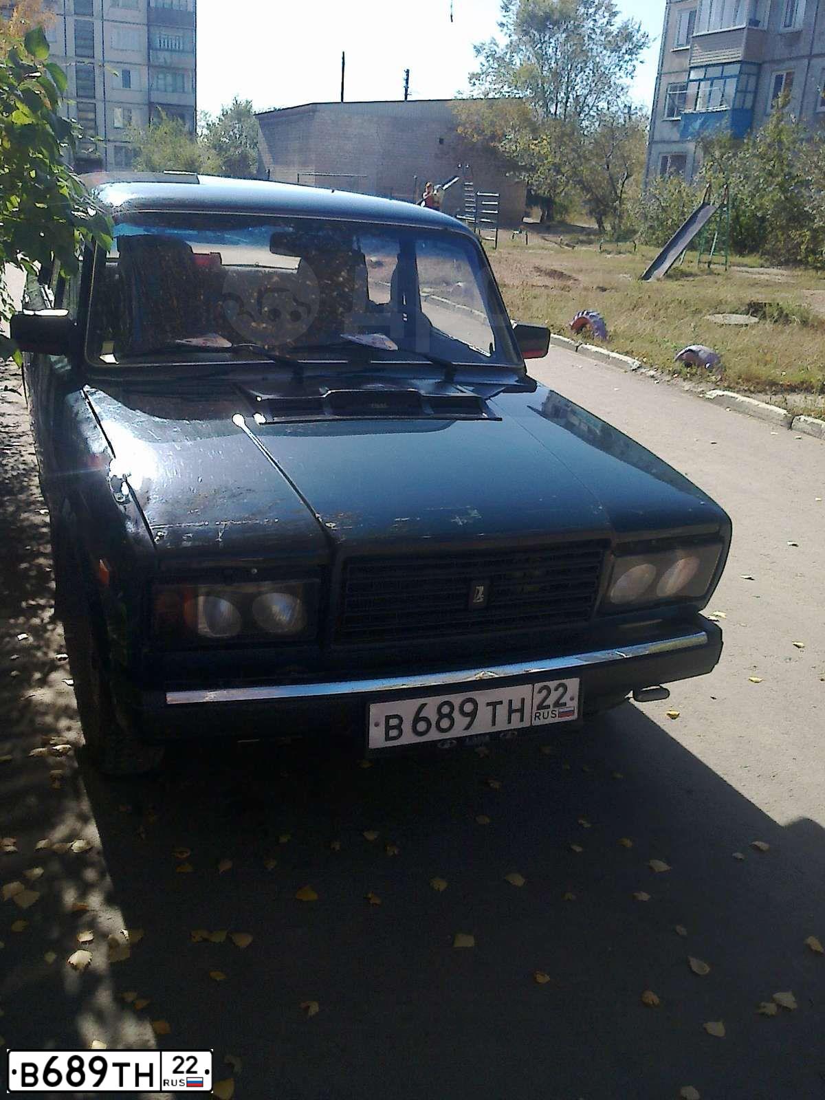 Фото автомобиля LADA 2107, 2007 — госномер Т372АС154. Цвет: Темно-зеленый