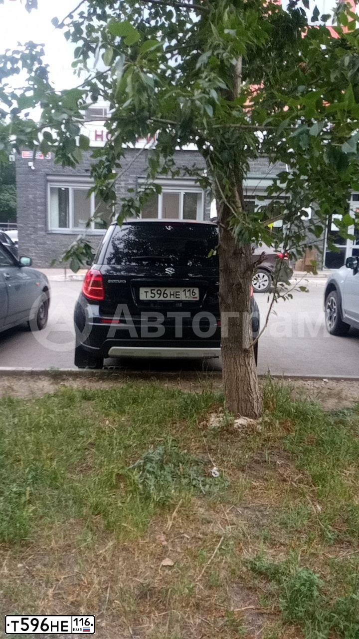 Фото автомобиля SUZUKI SX4, 2013 — госномер Н196ТН702. Цвет: ЧЕРНЫЙ