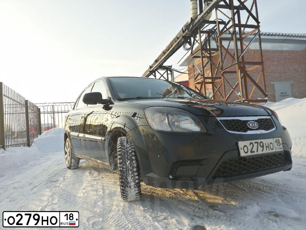 Фото автомобиля KIA RIO, 2010 — госномер О571ТН790. Цвет: ЧЕРНЫЙ
