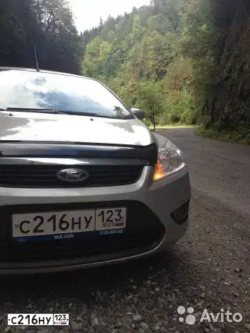 Фото автомобиля FORD FOCUS, 2011 — госномер С216НУ123. Цвет: серебристый