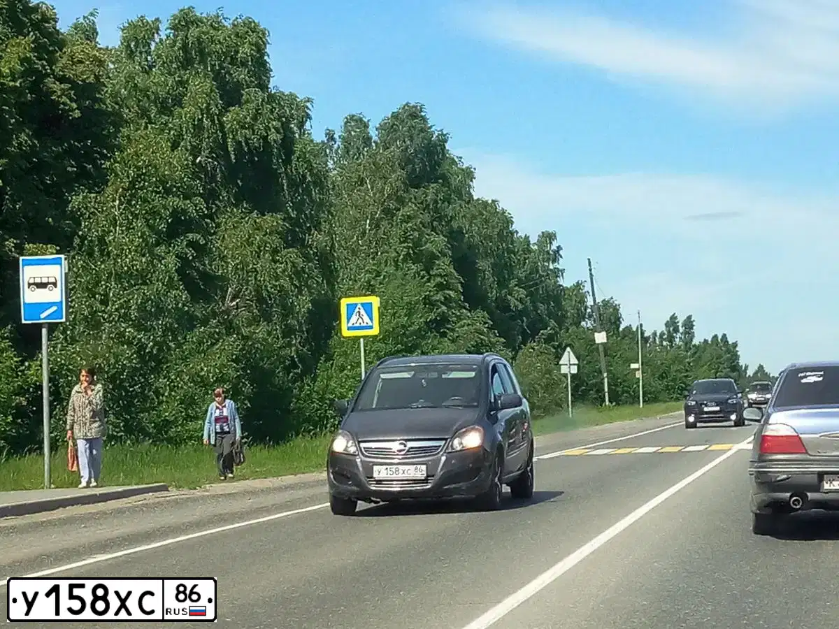 Фото автомобиля OPEL ZAFIRA, 2012 — госномер У158ХС86. Цвет: ТЕМНО-СЕРЫЙ