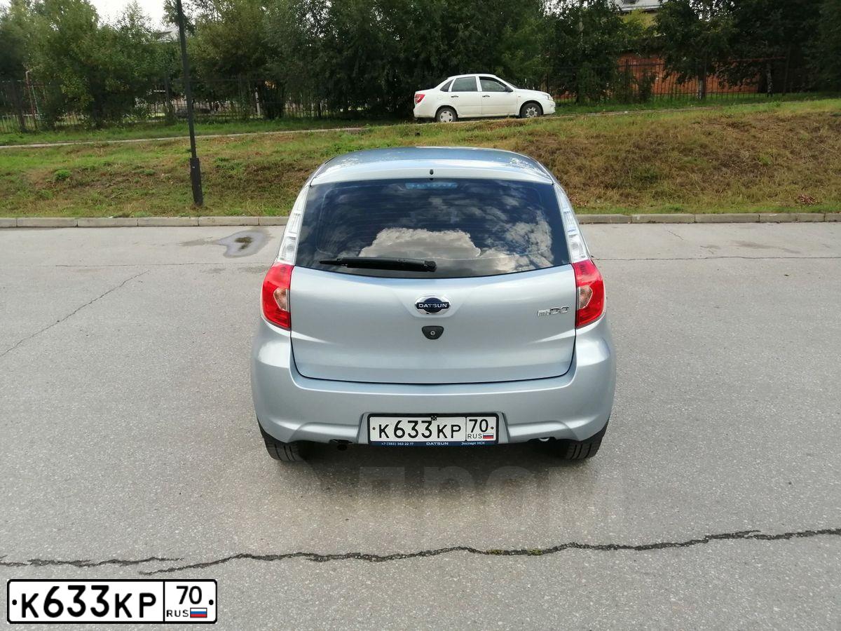 Фото автомобиля DATSUN MI-DO, 2015 — госномер К633КР70. Цвет: СВЕТЛО-ГОЛУБОЙ