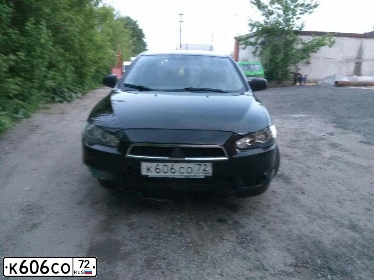 Фото автомобиля MITSUBISHI LANCER, 2008 — госномер Т937ТМ72. Цвет: ЧЕРНЫЙ