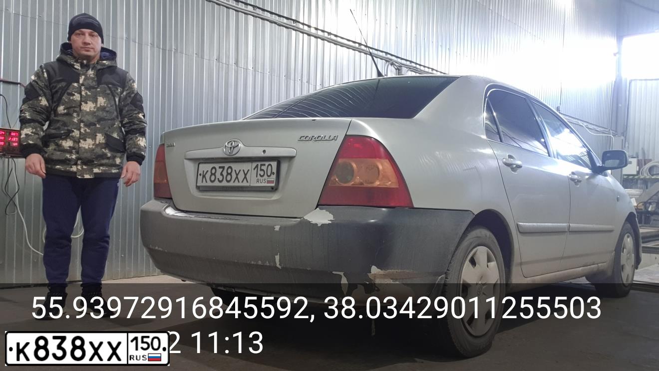 Фото автомобиля TOYOTA COROLLA, 2004 — госномер Е007ЕЕ50. Цвет: СЕРЕБРИСТЫЙ