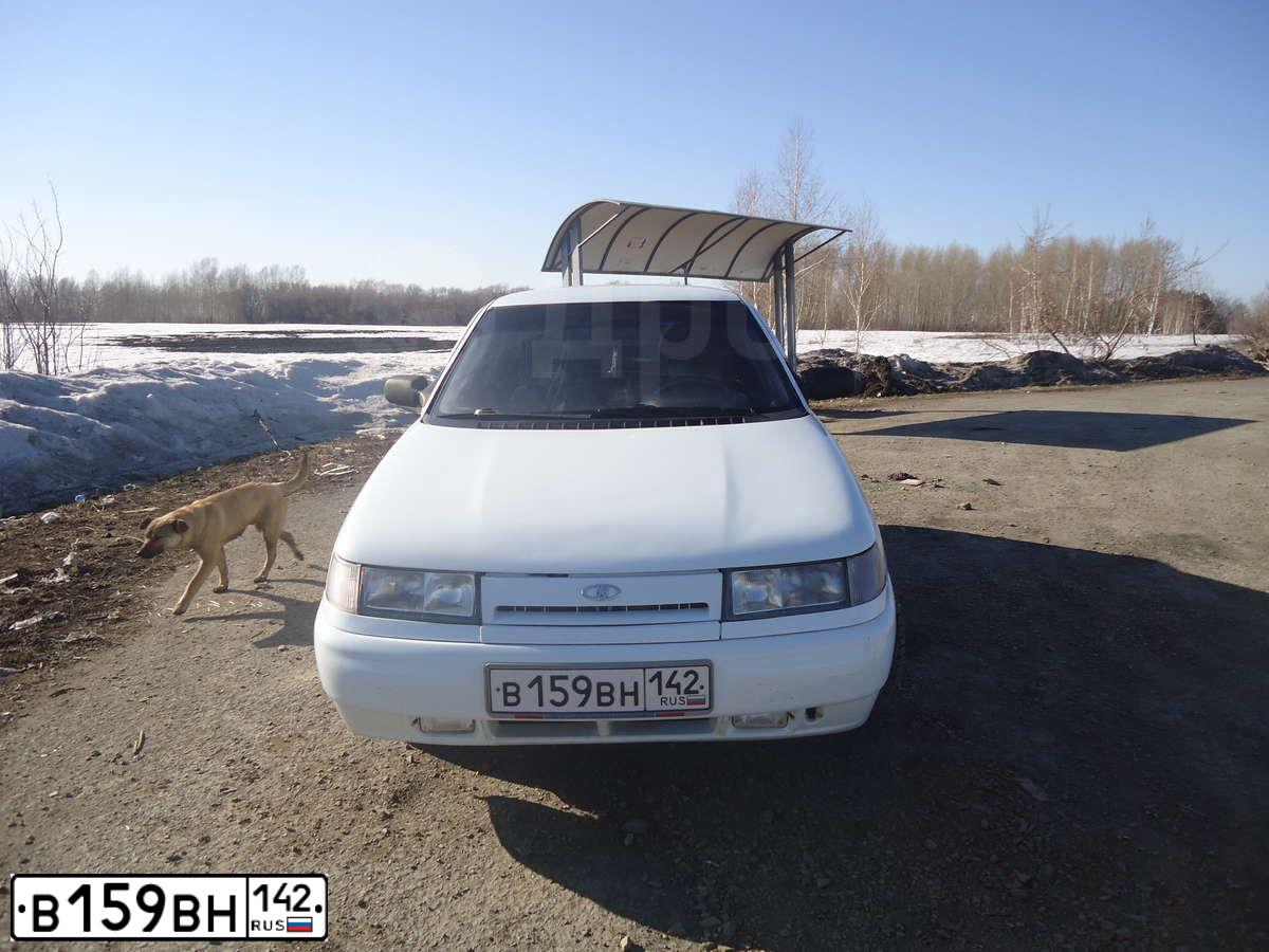 Фото автомобиля LADA 2112 LADA, 2002 — госномер В159ВН142. Цвет: Белый черный 