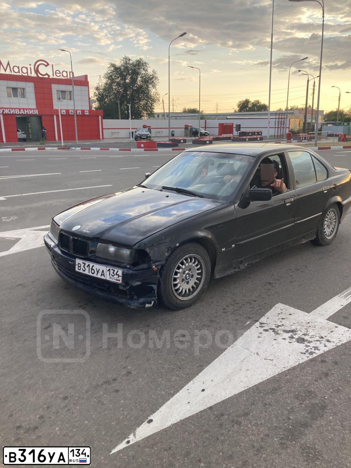 Фото автомобиля BMW SERIE 3, 1991 — госномер К030ХР34. Цвет: ЧЕРНЫЙ