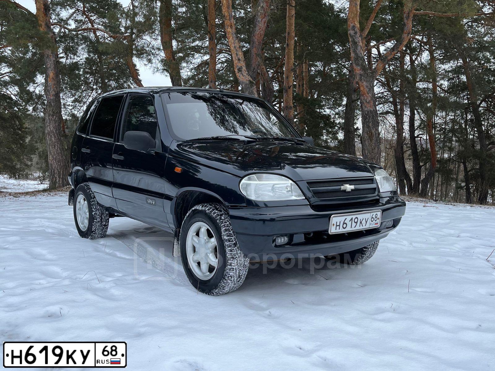 Фото автомобиля CHEVROLET NIVA, 2006 — госномер Н619КУ68. Цвет: Черно-синий металлик