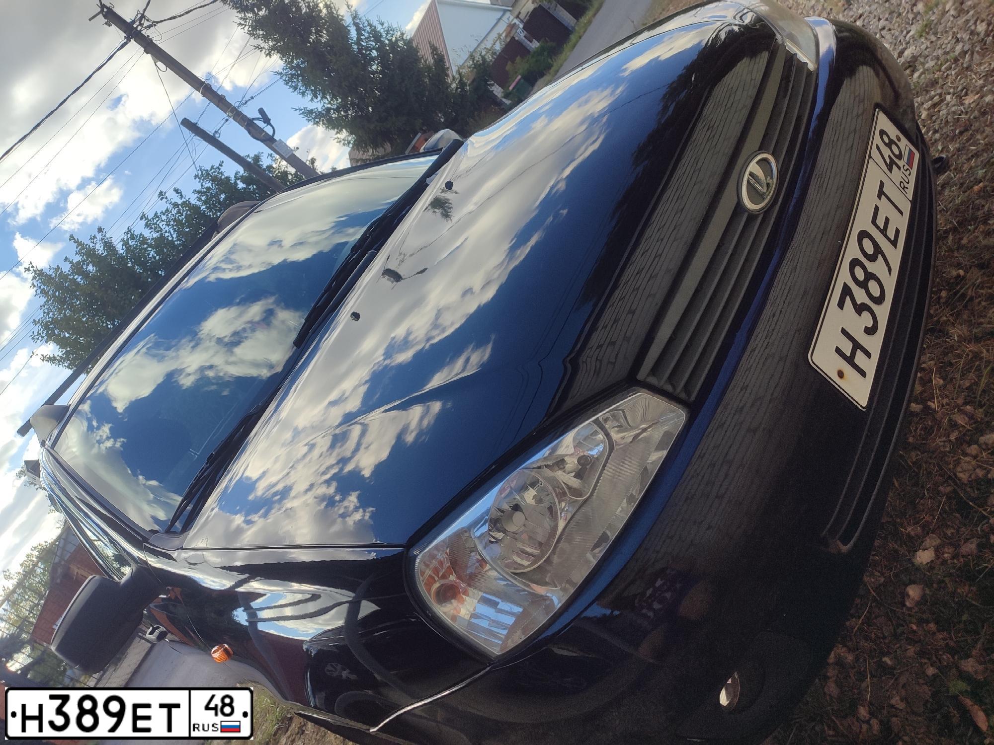 Фото автомобиля LADA 1117 KALINA, 2010 — госномер Н389ЕТ48. Цвет: ЧЕРНЫЙ
