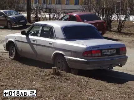 Фото автомобиля GAZ 3110 WOLGA, 2005 — госномер Н565МВ29. Цвет: ФИОЛЕТОВЫЙ