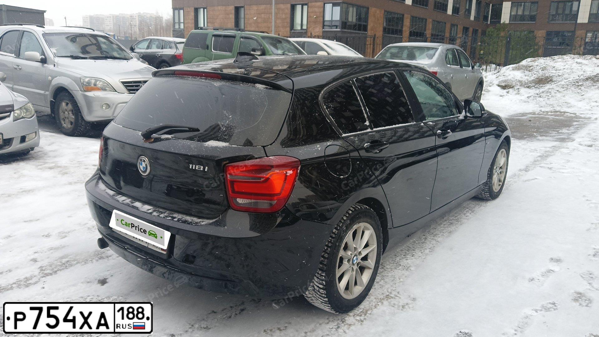 Фото автомобиля BMW SERIE 1, 2012 — госномер Е561ВТ122. Цвет: ЧЕРНЫЙ