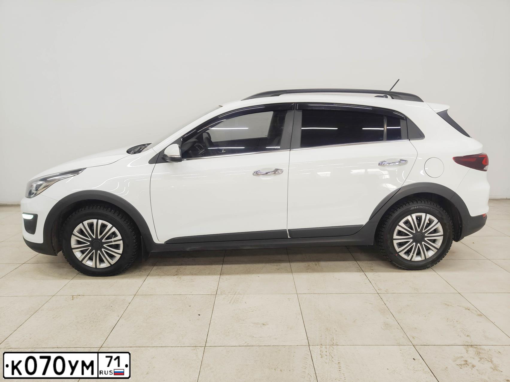 Фото автомобиля FORD FOCUS, 2012 — госномер Т624ОН71. Цвет: Белый