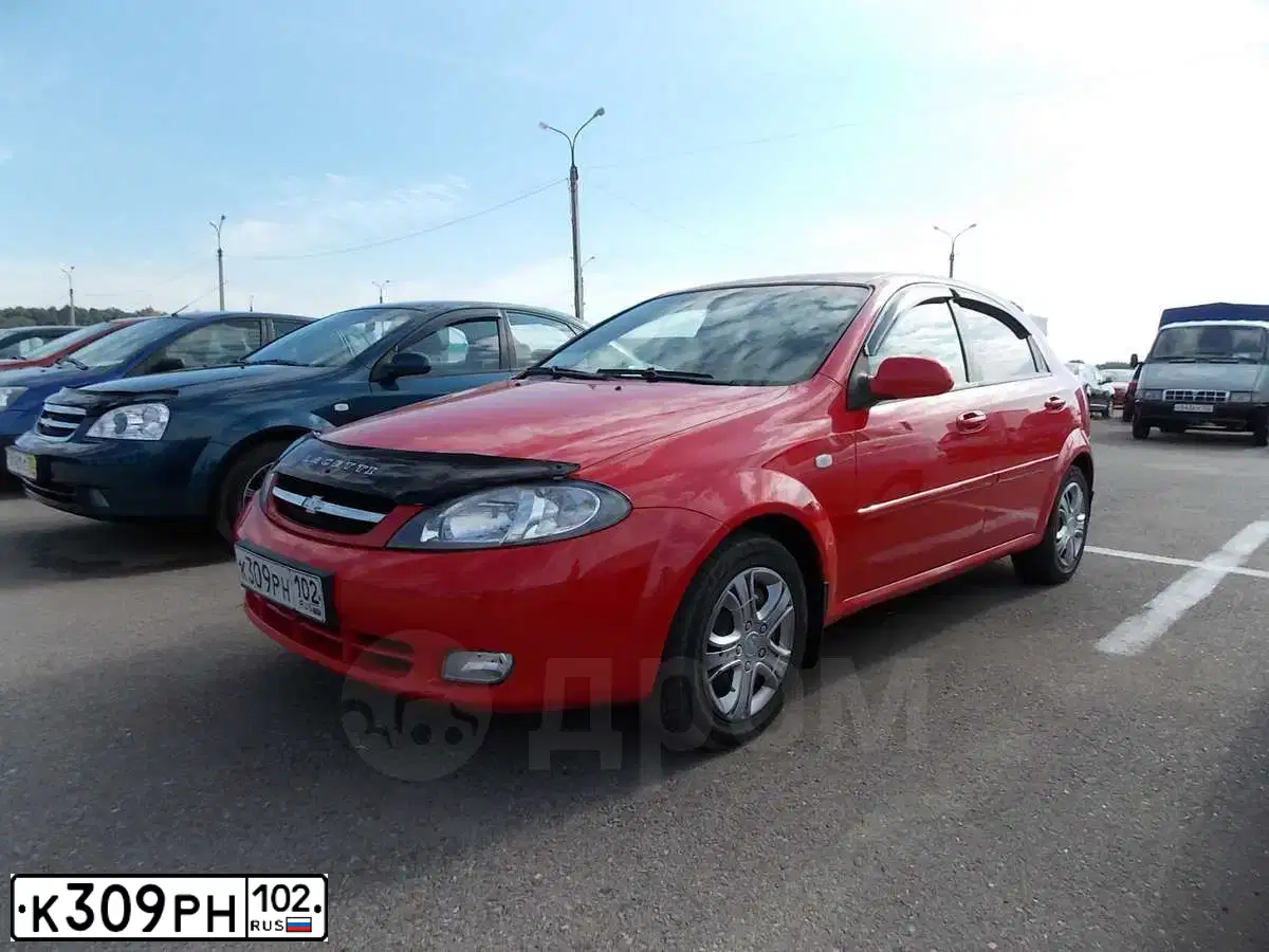 Фото автомобиля CHEVROLET LACETTI, 2007 — госномер Р456РК102. Цвет: Красный