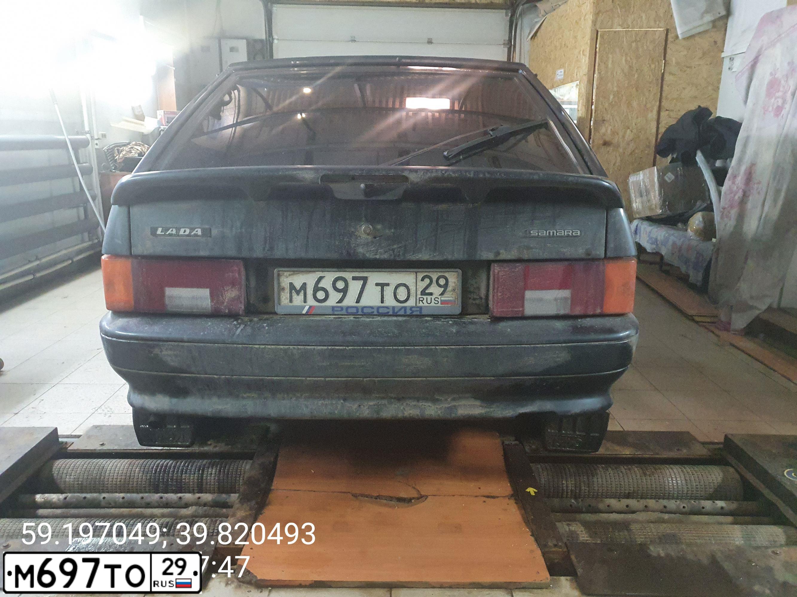 Фото автомобиля LADA 2114 SAMARA, 2012 — госномер М697ТО29. Цвет: Сине-зеленый