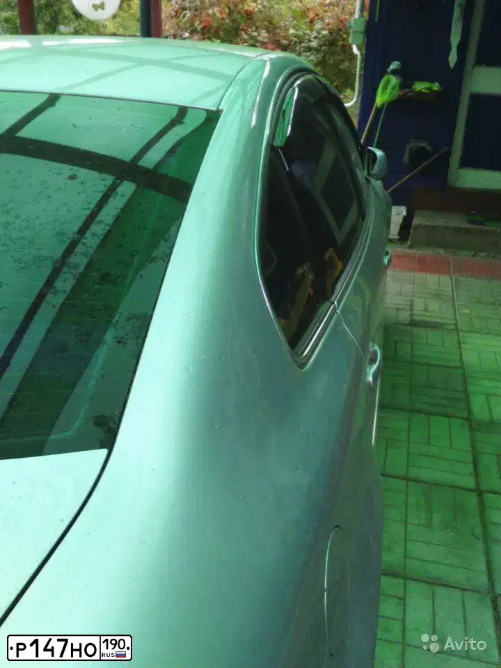 Фото автомобиля VOLKSWAGEN PASSAT, 2003 — госномер Р147НО190. Цвет: Серебристый