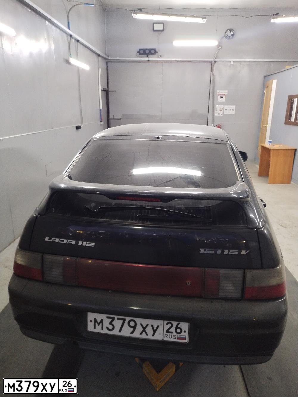 Фото автомобиля LADA 2112, 2007 — госномер Н377СТ15. Цвет: СИНЕ-ЧЕРНЫЙ