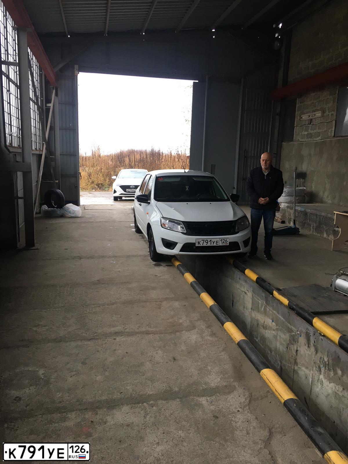 Фото автомобиля LADA 2190 GRANTA, 2015 — госномер К791УЕ126. Цвет: Белый