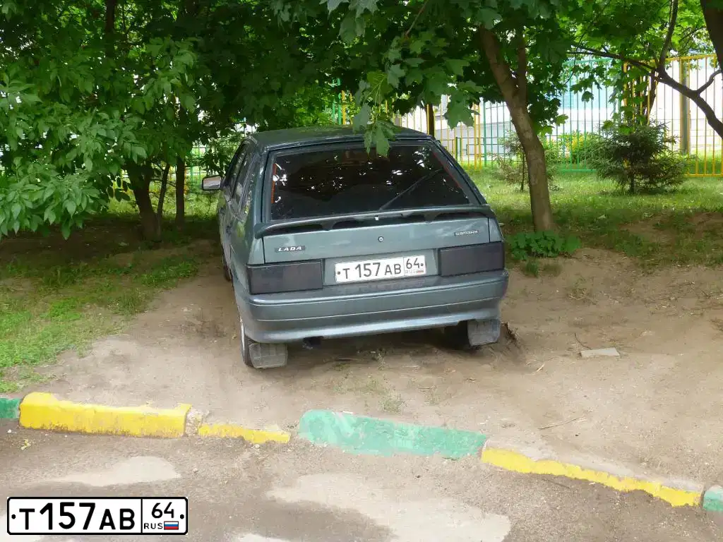 Фото автомобиля LADA 2114 SAMARA, 2011 — госномер Т157АВ64. Цвет: СИНЕ ЗЕЛЕНЫЙ