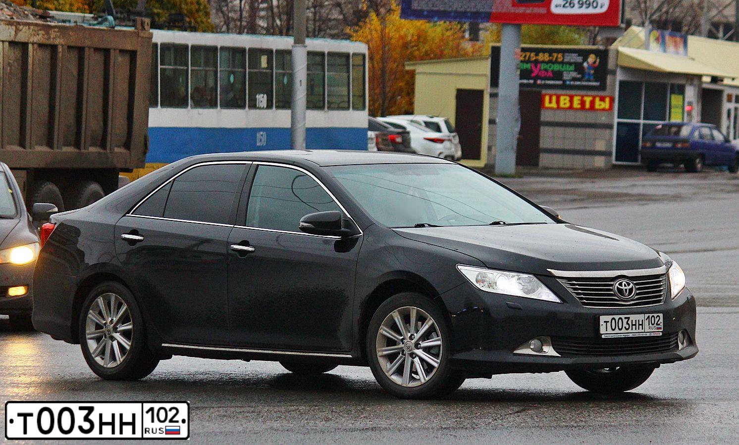 Фото автомобиля TOYOTA CAMRY, 2014 — госномер Н445КЕ702. Цвет: ЧЕРНЫЙ МЕТАЛЛИК