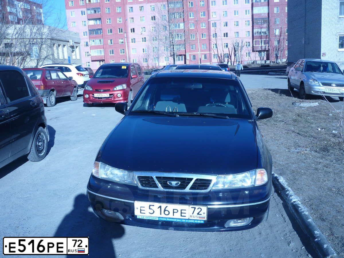 Фото автомобиля DAEWOO NEXIA, 2007 — госномер Р105РС72. Цвет: ЧЕРНО-СИНИЙ