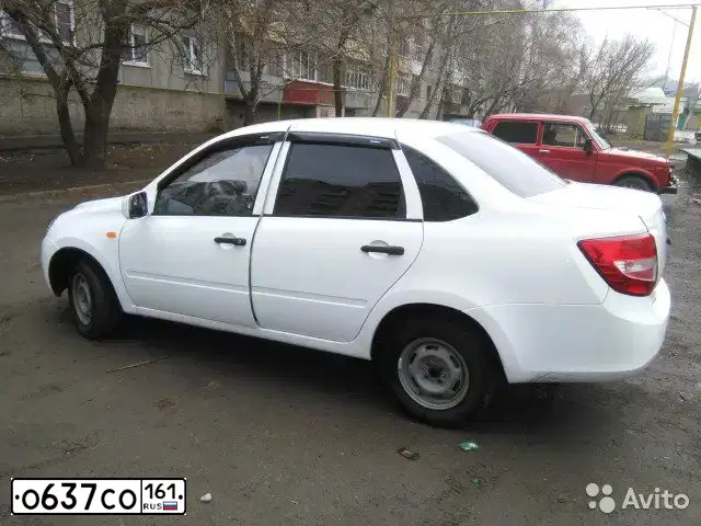 Фото автомобиля LADA 2190 GRANTA, 2014 — госномер О637СО161. Цвет: Белый