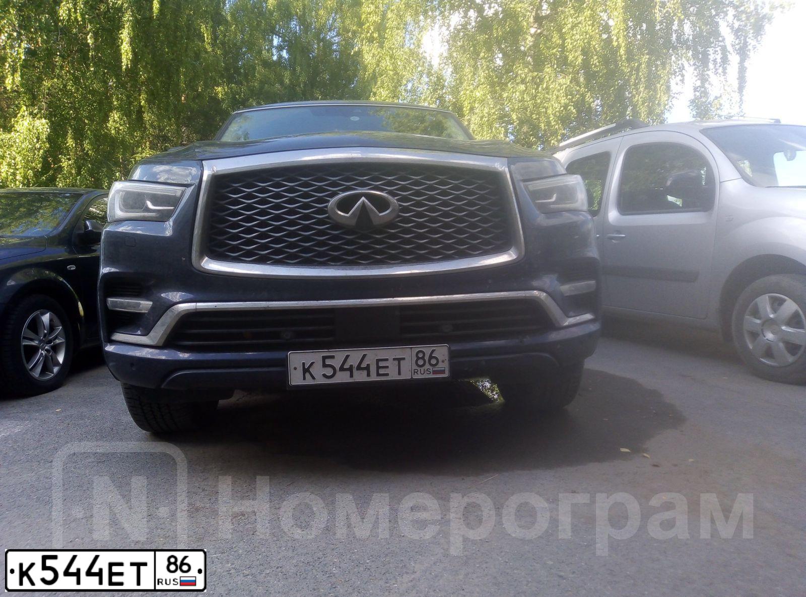 Фото автомобиля JEEP GRAND CHEROKEE, 2012 — госномер К544ЕТ86. Цвет: ТЕМНО-СИНИЙ