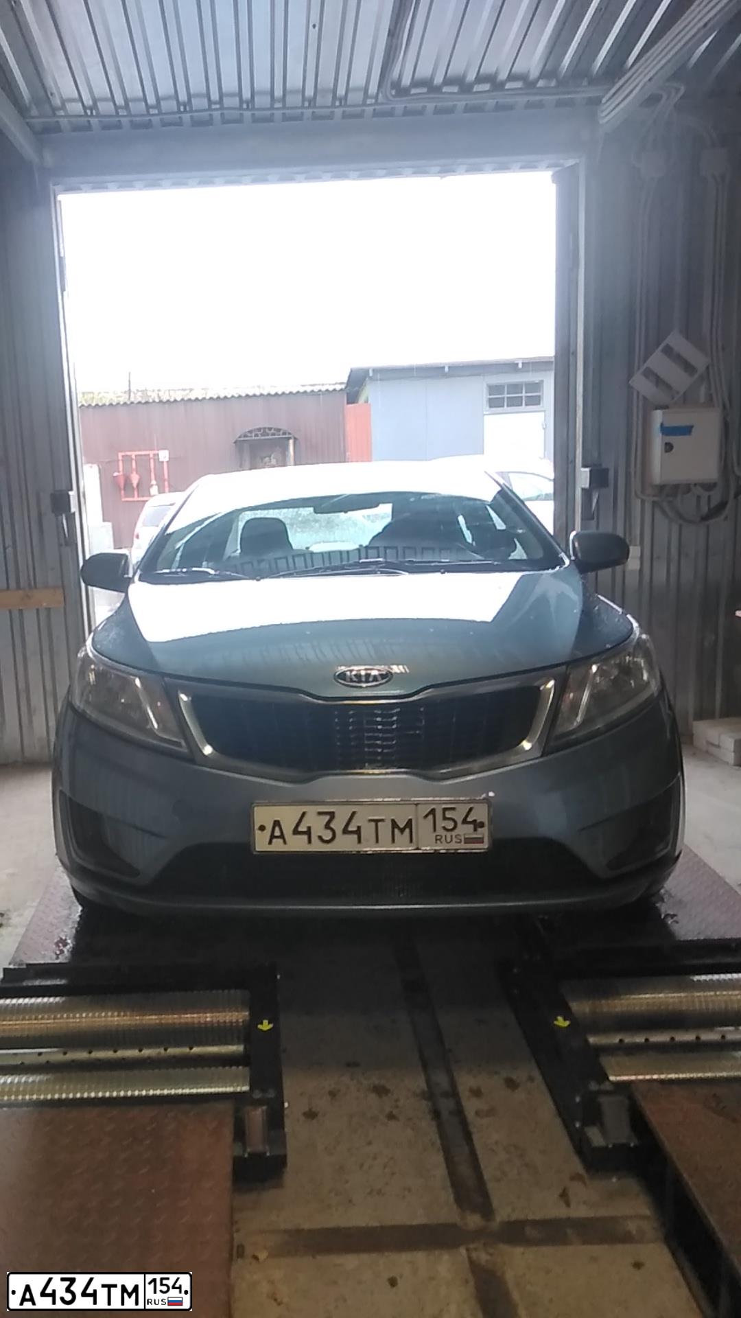 Фото автомобиля KIA RIO, 2011 — госномер К105ВС53. Цвет: голубой