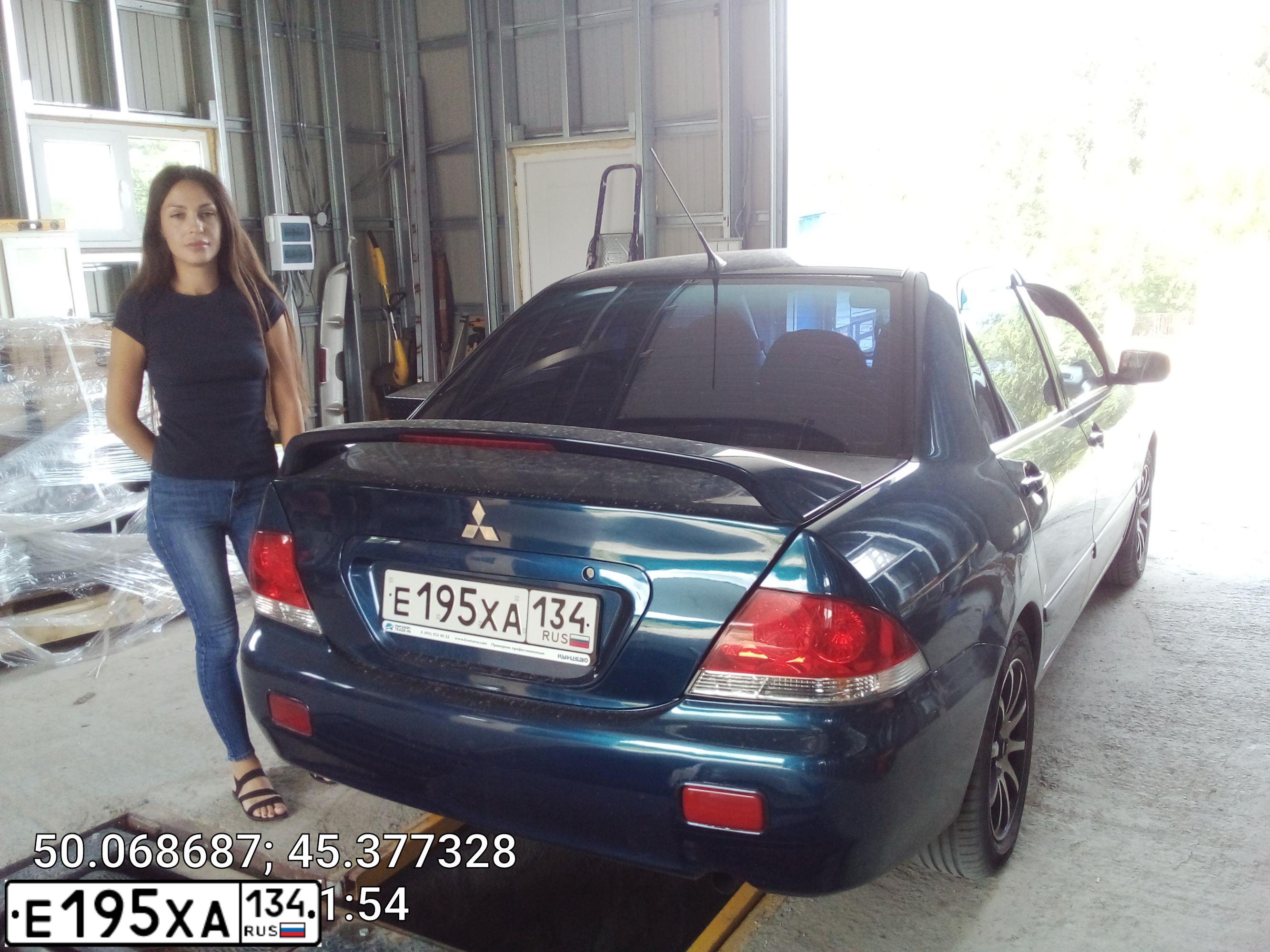 Фото автомобиля MITSUBISHI LANCER, 2006 — госномер А691НН190. Цвет: синий