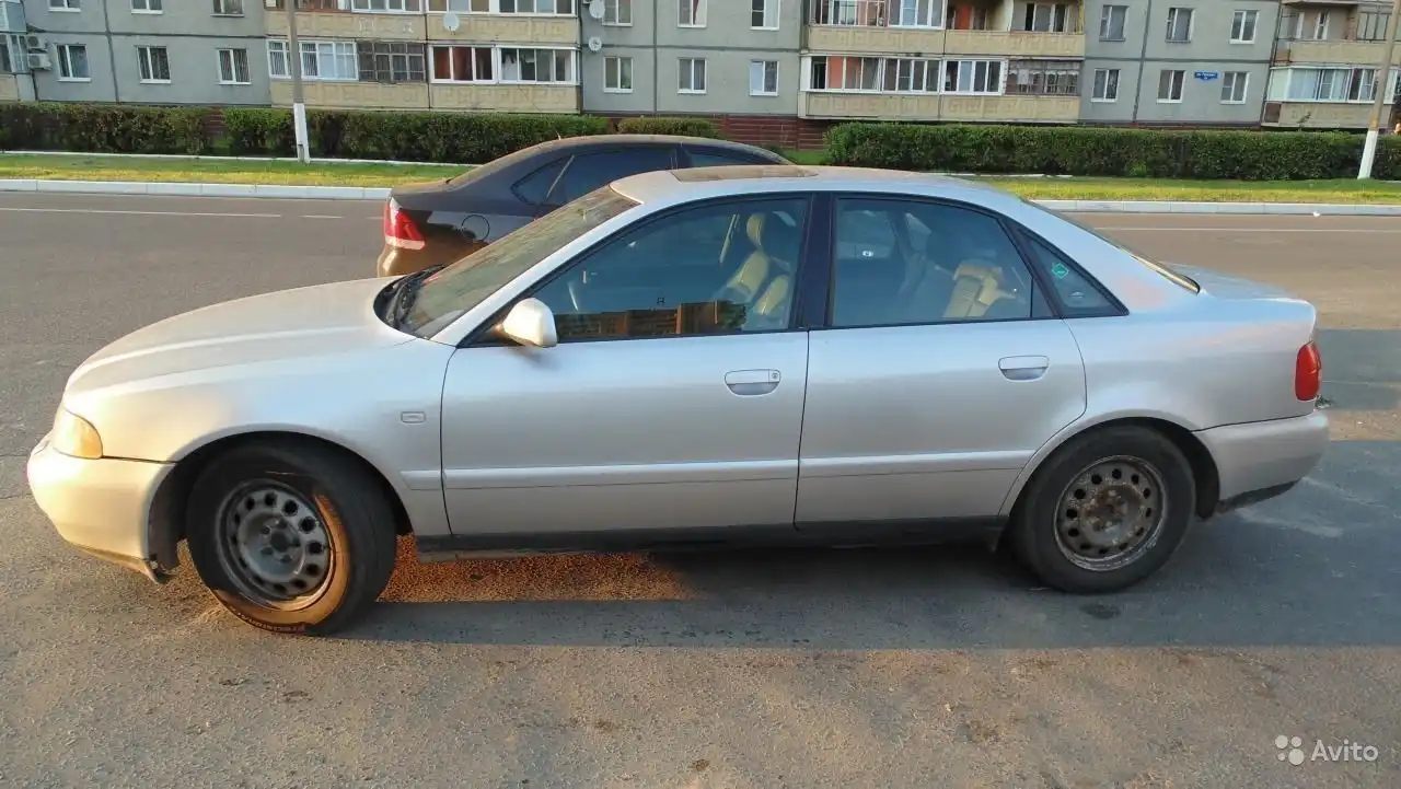 Фото автомобиля AUDI A4, 1999 — госномер М911ЕН702. Цвет: Серебристый